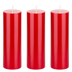 three red candles sitting next to each other