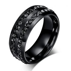 black wedding ring with white diamonds on it