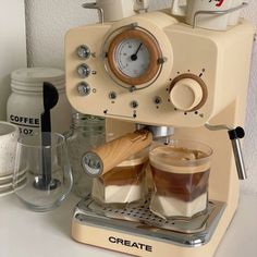 an espresso machine sitting on top of a counter