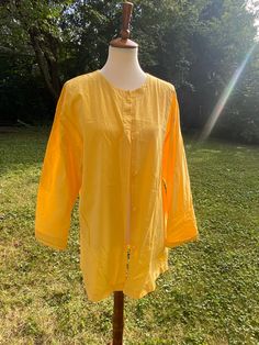 "Great 3/4 length sleeve yellow cotton button up tunic. Estate find, owner was a seamstress. This has no tags, so it is likely handmade. No holes, tears, or stains. Modern size approximately XL-XXL Measurements are: 25\" armpit to armpit 30\" total length" Yellow Long Sleeve Casual Tunic, Yellow Long Sleeve Tunic For Spring, Casual Yellow Tunic Blouse, Cotton Blouse With 3/4 Sleeves For Daywear, Spring Cotton Button-up Tunic, Yellow Relaxed Fit Cotton Blouse, Yellow Relaxed Fit Blouse For Daywear, Yellow Cotton Blouse With Relaxed Fit, Summer Yellow Long Sleeve Tunic