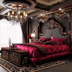 a fancy bedroom with chandelier and red bedding