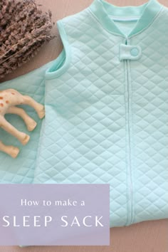 a baby's sleeping bag with the words how to make a sleep sack