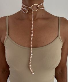 ** Pearl Necklace loops through Ring and can be wrapped once or multiple times. PEARLS are symbolic of wisdom gained through experience. The gems are believed to offer protection, as well as attract good luck and wealth. They are well-known for their calming effects. Pearls have a way of bringing balance to your karma, bring illumination, enlightenment, and insights on a mental level. Pearls symbolize purity and is known as a “stone of sincerity”. It brings truth to situations and loyalty to a “ Adjustable Long Wire Wrapped Necklace, Elegant Wire Wrapped Lariat Jewelry, Elegant Natural Stones Jewelry For Meditation, Elegant Natural Stone Jewelry For Meditation, Spiritual Long Gemstone Necklace, Adjustable Gemstone Amulet Jewelry, Bohemian Pearl Chain For Jewelry Making, Adjustable Infinity Fine Jewelry, Elegant Wire Wrapped Necklaces