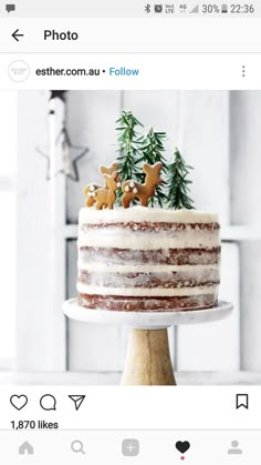 a cake with frosting and decorations on top