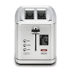 a silver toaster sitting on top of a white table