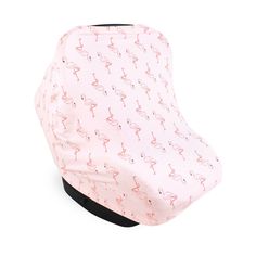 pink flamingo print car seat cover on top of a black head rester holder