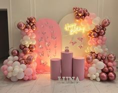 a birthday party with balloons and decorations