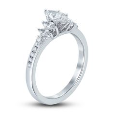 a diamond engagement ring with three stones on the side