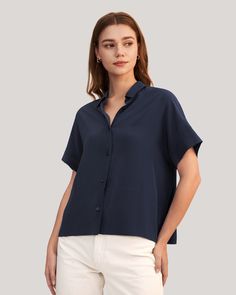 A favorite, refreshed. The Boxy Fit Short Sleeve Shirt has a classic collar, a clean button front, oversized grown-on sleeves, and a relaxed boxy fit. Dress it up with trousers and heels, or down with your favorite jeans for a casual-yet-polished look. Worn either way, you’re guaranteed to not only look great but feel relaxed and comfortable. Spring Summer Capsule Wardrobe, French Wardrobe, Silk Pajamas Women, Silk T Shirt, Camisole Set, Small Wardrobe, Shirt Blouses Women's, Summer Capsule Wardrobe, Summer Capsule