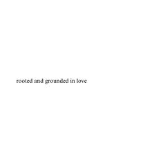 a white wall with the words rooted and grounded in love