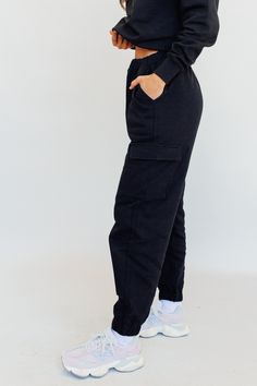 Introducing our exclusive limited-edition women's oversized cargo sweatpants. Crafted from high-quality materials, these sets redefine comfort and style. Available in sizes XS to 2X, find your perfect fit with regular or tall lengths for the bottoms. Embrace the freedom of movement and comfy chic with our meticulously designed, oversized fits. Elevate your loungewear game. Shop now before they're gone. -High rise -Heavyweight fleece fabric -Oversized silhouette -Elastic waistband -Interior draws Relaxed Fit Cargo Style Joggers For Loungewear, Urban Style Sweats With Side Pockets For Streetwear, Winter Loungewear Joggers With Cargo Pockets, Urban Streetwear Sweats With Side Pockets, Athleisure Joggers With Pockets For Elevated Casual Occasions, Utility Sweatpants With Multiple Pockets For Loungewear, Urban Sweats With Pockets For Streetwear, Utility Relaxed Fit Joggers For Loungewear, Relaxed Fit Utility Joggers For Loungewear