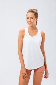 88% Nylon. 12% Spandex 4-way stretch. breathable and sweat-wicking Classic racerback design Cool and refreshing High elastic stretch For: Tennis. Skating. Golf. Dance. Lounging. Yoga & Studio. etc. Racerback Workout Tank Top, Stand Collar Jackets, Black Bathing Suits, Strapless Bandeau, Workout Tank Top, Black Swimwear, Sport Tank Tops, High Waist Bottoms, Sleek Fashion