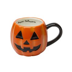 a coffee mug with a jack - o'- lantern face on it and the words happy halloween