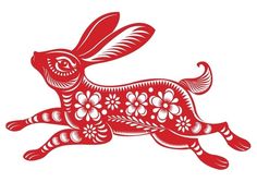 a red paper cut rabbit with flowers on it's tail royalty photo and royalty illustration