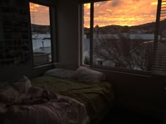 the sun is setting in an empty bedroom