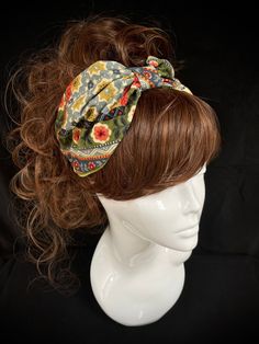 Fabric turban head band in a retro cotton print, on the 1940s land girl style and 1950s Rockabilly fashions. A real statement piece with a standard 1 inch width inner Alice band attached within the lining to provide an easy to wear design. Our range of turban bands are the perfect easy to wear accessory and are worn exactly as an Alice band finishing behind the ears. (These bands do not go all the way around the back of the head, so are perfect for all hair styles. This unique creation is a stun Adjustable Bohemian Headwrap Headband, Bohemian Patterned Bandana For Spring, Trendy Festival Headband, Bohemian Summer Headband, Bohemian Floral Print Summer Bandana, Bohemian Bandana Print Headscarf For Summer, Bohemian Headwrap One Size Fits Most, Bohemian Adjustable Headwrap With Matching Headband, Adjustable Bohemian Headwrap With Matching Headband