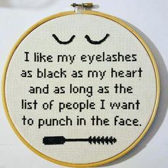 a cross stitch pattern with the words i like my eyelashes as black as my heart and as long as the list of people i want to punch in the face