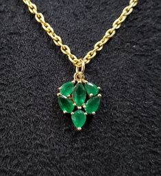 1. Emerald 14k Gold Pendant 2. Made to Order 3. Gemstone - Emerald 4. Jewelry Type - Pendant 5. Total weight - 1.171 Gram Approx 6. Emerald Weight - 1.00 Carats 7. Gold Weight - 0.971 Grams Approx. 8. Emerald Size - Mix 9. Gold Purity - 14k 10. Pendant Bails Size - 5 mm 11. Zambian Emerald 12. Ready to dispatch in 1 - 2 days. 13. Handmade Items 14. AAA Quality Pendant 15. 1 Quantity Available 16. Inclusion based Pictures are taken under natural and day light. Elegant Jewel Pendant Gemstones, Fine Jewelry In 14k Gold With Stones, Briolette Emerald Necklace For Formal Occasions, Marquise Emerald Yellow Gold Jewelry, Formal Emerald Briolette Necklace, Formal Briolette Emerald Necklace, Green Marquise 14k Gold Jewelry, Elegant Emerald Pendant Gemstones, Yellow Gold Gemstones For Anniversary