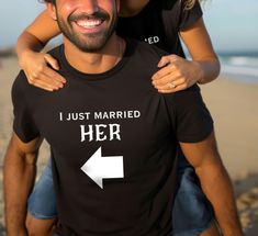 Welcome to Epic Escape Essentials! Introducing our high quality heavy cotton t-shirts, featuring the phrases, "I just married HIM" and "I just married HER" with the arrows. Comfortable, sturdy and the perfect wedding gift for the bride and groom to wear on their honeymoon! And long after, as well ;) 🔎Find other Epic travel apparel and accessories here ➡  https://epicescapeessentials.etsy.com T-SHIRT INFORMATION (Sizes S - 5XL) *Made with medium fabric (5.3 oz/yd² (180 g/m consisting of 100% cotton for year-round comfort that is sustainable and highly durable.  *The classic fit of this shirt ensures a comfy, relaxed wear while the crew neckline adds that neat, timeless look that can blend into any occasion, casual or semi-formal.  *The tear-away label means a scratch-free experience with n Bride Groom Shirts, Wedding Gift For The Bride, Travel Apparel, Groom Shirts, Couple Tees, Gift For The Bride, Travel Tees, Wedding Apparel, Him And I