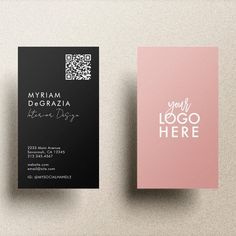 two business cards sitting on top of each other