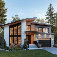 a modern style house with lots of windows and grass in front of the door is shown