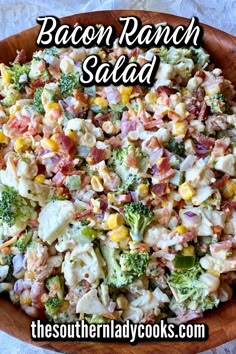 bacon ranch salad with broccoli and corn in a wooden bowl