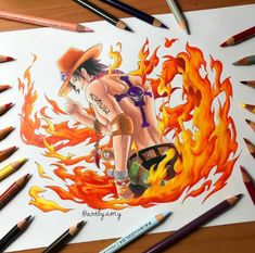 a drawing of a woman with fire on her chest and hat, surrounded by colored pencils