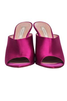 Step out in head-turning style with these Nina Ricci magenta pink satin mule pumps. The open toe heel showcases a clear heel design for a light and airy look, perfect for any date night. Make a statement and show off your fashion-savvy with these eye-catching and chic mules! Size 7.5 Satin fabric upper Clear acrylic heel Pointed toe Heel height 4" Mule Pumps, French Girl Chic, Chic Shop, Heel Design, Buy Shoes Online, Magenta Pink, Clear Heels, Pointed Toe Heels, Designer Heels