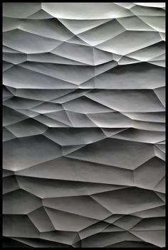 black and white photograph of an abstract wallpaper design that looks like paper or cloth