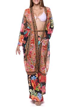 Go from beach to boardwalk in this sun-ready cover-up cape that's secured with a front tie and rendered in a bright print. Shawl collar Long sleeves Front patch pockets
 Removable waist tie 100% polyester Hand wash, dry flat Imported Multicolor Long Sleeve Kimono For Beach Cover-up, Long Multicolor Boho Print Cover-up, Bohemian Multicolor Vibrant Print Cover-up, Multicolor Bohemian Printed Cover-up, Cole Haan Women Shoes, Multicolor Printed Kimono For Beach Cover-up, Cole Haan Women, Concert Looks, Sweaters And Leggings