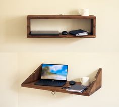 two wooden shelves with laptops and books on them, one holding a coffee cup