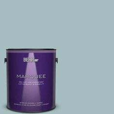 a purple paint can with the words marquee on it's bottom half