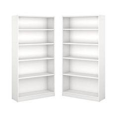 two white bookcases with open doors on each side and one closed door in the middle