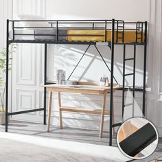 a bunk bed with a desk underneath it in a room next to a white wall