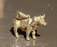 This listing is for a 14K Yellow Gold Bull or Steer Charm Pendant This piece measures 1" from front to back & 3/4" high from the bottom to the top of the head The bull scratch tests as 14K gold purity & it weighs 10.4 grams! Love the detail on this piece! Please view all pictures & please message with questions. Thank you! Haddonfieldartgallery Recently “picked” from the Greater Philadelphia area, we personally hand-select each antique, piece of art, jewelry or any other item of interest. Each piece is personally in our possession, and ready to ship! We specialize in art work, watches, jewelry, silver, gold and coins. We like to keep each item in its original form when found, unless otherwise specified. We do not disturb our vintage jewelry in order to keep its original patina leaving it t The Bull, Fine Jewellery Necklace, Jewelry Silver, Watches Jewelry, Art Jewelry, Piece Of Art, Charm Pendant, All Pictures, Art Work