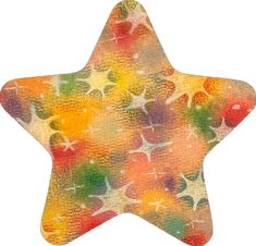 a multicolored star shaped ornament on a white background