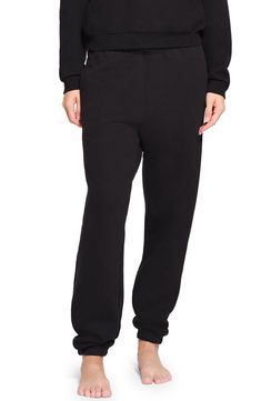 SKIMS Cotton Blend Fleece Classic Joggers | Nordstrom Fleece Bottoms With Elastic Cuffs For Loungewear, Fleece Sweats With Elastic Cuffs For Loungewear, Relaxed Fit Fleece Sweatpants, Fleece Sweatpants With Elastic Waistband For Loungewear, Fleece Sweatpants With Ribbed Cuffs For Lounging, Cozy Fleece Sweatpants With Ribbed Waistband, Fleece Pants With Elastic Cuffs For Loungewear, Winter Cotton Sweats For Lounging, Relaxed Fit Fleece Pants For Lounging