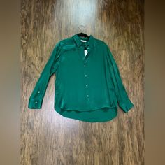 Zara Satin Effect Shirt Size M Classic Zara Tops For Workwear, Zara Collared Tops For Work, Zara Long Sleeve Office Shirt, Zara Collared Blouse For Work, Green Tops With Shirttail Hem For Fall, Green Shirttail Hem Top For Fall, Elegant Green Zara Shirt, Elegant Zara Shirt For Fall, Classic Green Office Tops