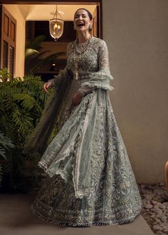 Semi-stitched Wedding Dresses, Eid Wedding Gown With Traditional Drape, Traditional Drape Wedding Gown For Eid, Eid Wedding Dress With Sheer Dupatta, Eid Ceremony Wedding Dress With Sheer Dupatta, Floor-length Wedding Dress For Eid, Sheer Dupatta Gown For Wedding And Eid, Ceremonial Green Dress With Dupatta, Green Ceremony Dress With Dupatta