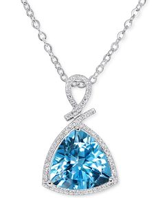 The harmonious beauty of a trillion-cut blue topaz is paired with the unrelenting glow of diamond pave on this exceptionally elegant white gold pendant necklace. Blue Topaz Jewelry With Pave Setting For Anniversary, Gift Jewelry With Blue Topaz In Pave Setting, Luxury Formal Necklace With Trillion Cut, Fine Jewelry Blue Topaz With Pave Setting, Trillion Cut Blue Topaz Wedding Jewelry, Blue Trillion Cut Diamond Jewelry, Trillion Cut Blue Topaz Jewelry With Accent Stones, Luxury Three-stone Trillion Cut Jewelry, Luxury Trillion Cut Blue Jewelry