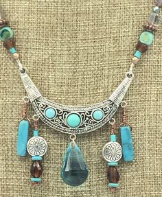 "Boho Turquoise Natural Stone Jewelry Set. Necklace and Earrings. Sw. Austrian Crystal Large Turquoise Drop on Necklace Focal. Earrings with Beaded Tassels. Magnetic Rhinestone Clasp. Jesse James Beads * Sw. Austrian Crystal Large focal drop *Turquoise  *Boho *Rhinestone Magnetic Clasp  *Necklace 18\" *Beaded Tassels *Turquoise Natural Stone *Necklace $45.00 *Earrings $15.50"