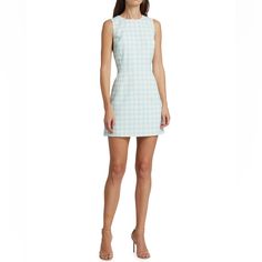 Alice And Olivia Clyde Houndstooth Sheath Dress Size 6 Only At Saks. This Charming Alice + Olivia Clyde Sheath Dress Boasts A Bright Houndstooth Pattern. Cut With A Crewneck, This Style Boasts A Sleeveless Silhouette. Crewneck Sleeveless Back Zip Closure 100% Polyester Dry Clean Imported Size & Fit About 33" From Shoulder To Hem Model Measurements: 5'10" Tall Model Is Wearing A Us Size 4 Nwt. Perfect Condition. Fitted Sleeveless Houndstooth Mini Dress, Fitted Sleeveless Mini Dress With Houndstooth Pattern, Fitted Plaid Tweed Dress For Summer, Chic Gingham Dress, Fitted White Mini Dress With Houndstooth Pattern, Fitted White Houndstooth Mini Dress, Chic Sleeveless Gingham Mini Dress, Chic Gingham A-line Dress, White Houndstooth Dress For Spring