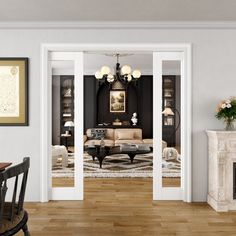 a living room filled with furniture and a fire place next to a dining room table