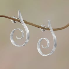 Curling below the ears spiral shapes are handcrafted of sterling silver in this pair of half-hoop earrings from Bali. Desi Antari designs these awe-inspiring earrings which are accentuated by a brushed-satin finish. Minimalistic Jewelry, Jewelry Minimal, Silversmith Jewellery, Silver Chandelier Earrings, Silver Post Earrings, Silver Jewelry Design, Light My Fire, Jewelry Picture, Earrings Inspiration