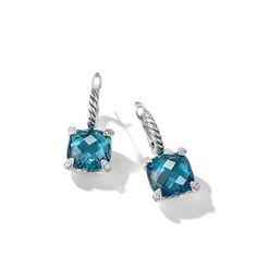 This exquisite product features a stunning combination of precious materials and gemstones. The primary metal used is high-quality sterling silver, while the primary gemstone is the brilliant topaz in a mesmerizing Hampton Blue color. Adding to the elegance are secondary diamonds and a beautiful Chatelaine collection design. David Yurman Earrings, Earrings With Diamonds, David Yurman Jewelry, Chatelaine, Monogrammed Items, David Yurman, Jewelry Pouch, Designer Earrings, Pave Diamonds