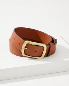 Pull together your look with the classic appeal of this brown leather belt with season-spanning versatility. Classic Leather Belt Buckles For Fall, Classic Leather Belt For Fall, Modern Leather Belt For Fall, Classic Leather Belts For Fall, Chic Leather Belt Buckles For Fall, Elegant Brown Belt Buckle For Workwear, Modern Leather Belt With Brass Buckle, Brown Leather Belt Buckles For Work, Modern Brown Belt Buckles For Business