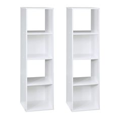 two white bookshelves sitting next to each other