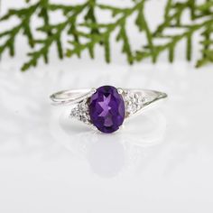 Oval Amethyst Ring With Prong Setting For Promise, Purple Oval Crystal Ring With Gemstone, Oval Amethyst Crystal Ring With Accent Stones, Amethyst Crystal Ring With Accent Stones, Fine Jewelry Purple Oval Crystal Ring, Oval Amethyst Ring With Gemstone Accents For Gift, Oval Amethyst Ring With Accent Stones For Gift, Oval Amethyst Ring With Gemstone Accents For Promise, Oval Crystal Ring With Gemstone Accents For Promise