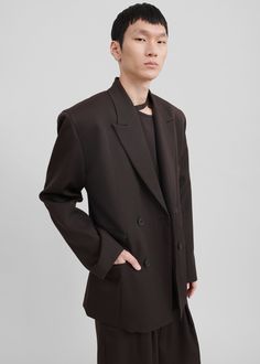 Color: Expresso Midweight woven fabric Regular fit Peak lapels Padded shoulders Front illusion flap pockets Double-breasted front button closure Lined 65% Viscose 15% Acrylic 12% Polyester 8% Alpaca Dry Clean By Louis Gabriel Nouchi. Imported Modern Double-breasted Workwear Blazer, Modern Double-breasted Blazer For Work, Office Blazer With Concealed Placket, Chic Semi-formal Outerwear With Suit Collar, Chic Semi-formal Outerwear With Lapel Collar, Chic Semi-formal Outerwear With Button Closure, Modern Button-up Outerwear For Work, Modern Button-up Workwear Outerwear, Workwear Outerwear With Double Button Closure And Lapel Collar