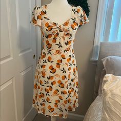 This Is A Side M But Fits Small, Especially Around The Bust. I Am 36c Cup And It’s Too Tight On My Chest. Probably Better For A Petite Person With A Smaller Chest. Absolutely Adorable Though!! Fitted Fruit Print Dress For Vacation, Fitted Summer Dress In Apricot Color, Casual Fruit Print Dresses For Spring, Casual Apricot Dress For Day Out, Fruit Print Dress For Day Out, Casual Lemon Print Dress For Garden Party, Retro Orange Dresses For Brunch, Retro Orange Dress For Brunch, Fitted Apricot Summer Dress